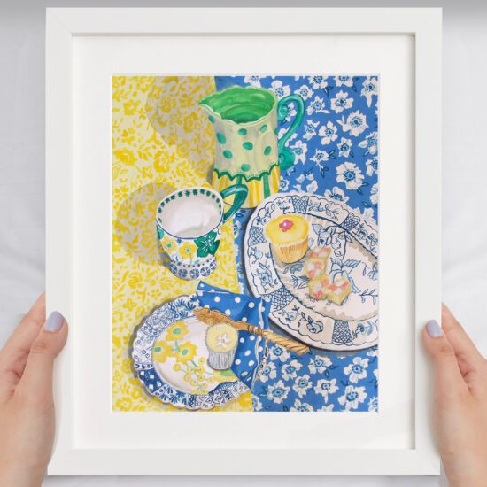 Tea Table an original painting by Claire Leggett. Two hands holding a mocked up image of Tea Table - an original painting by Claire Leggett